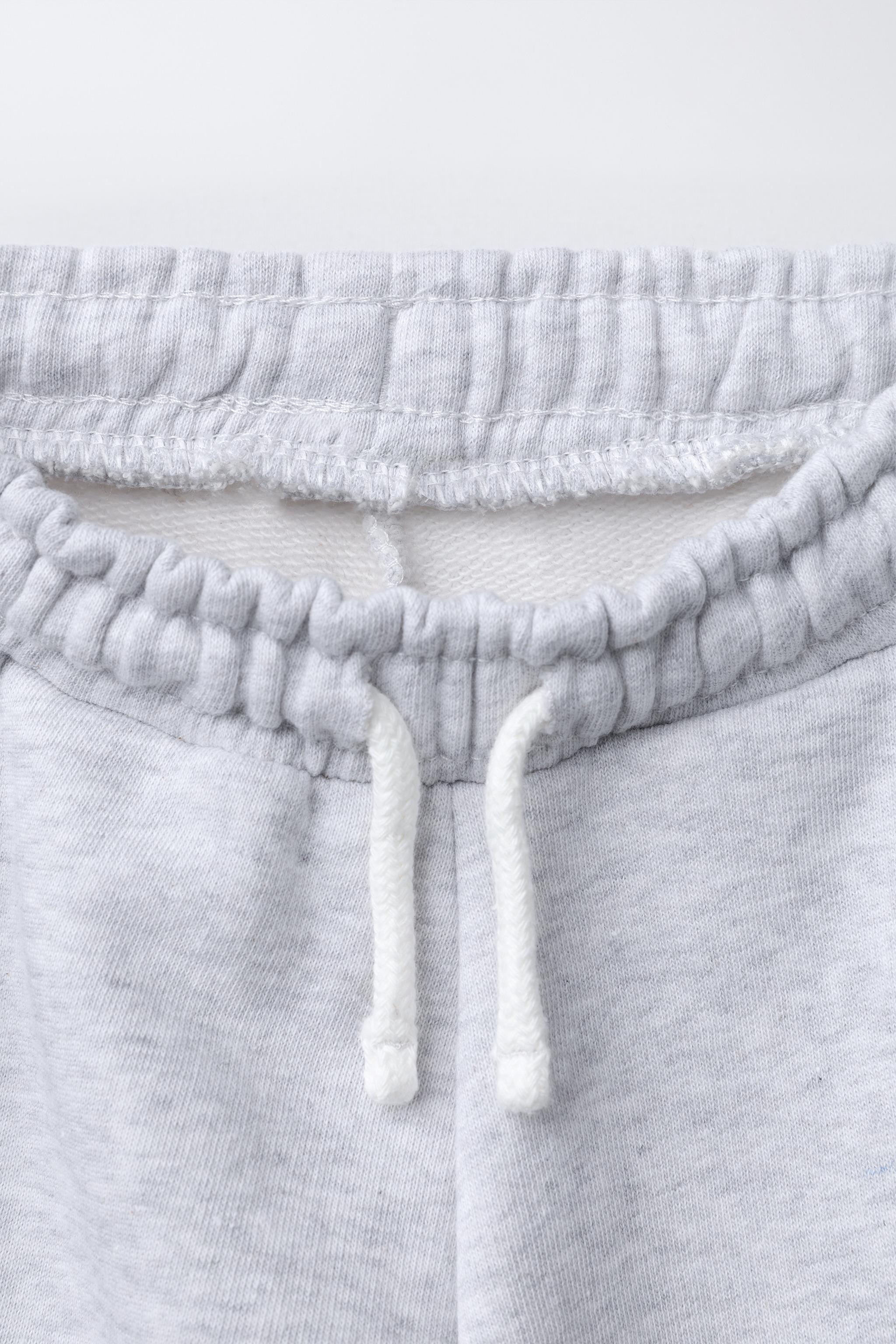 EMBROIDERED ANIMAL JOGGING PANTS